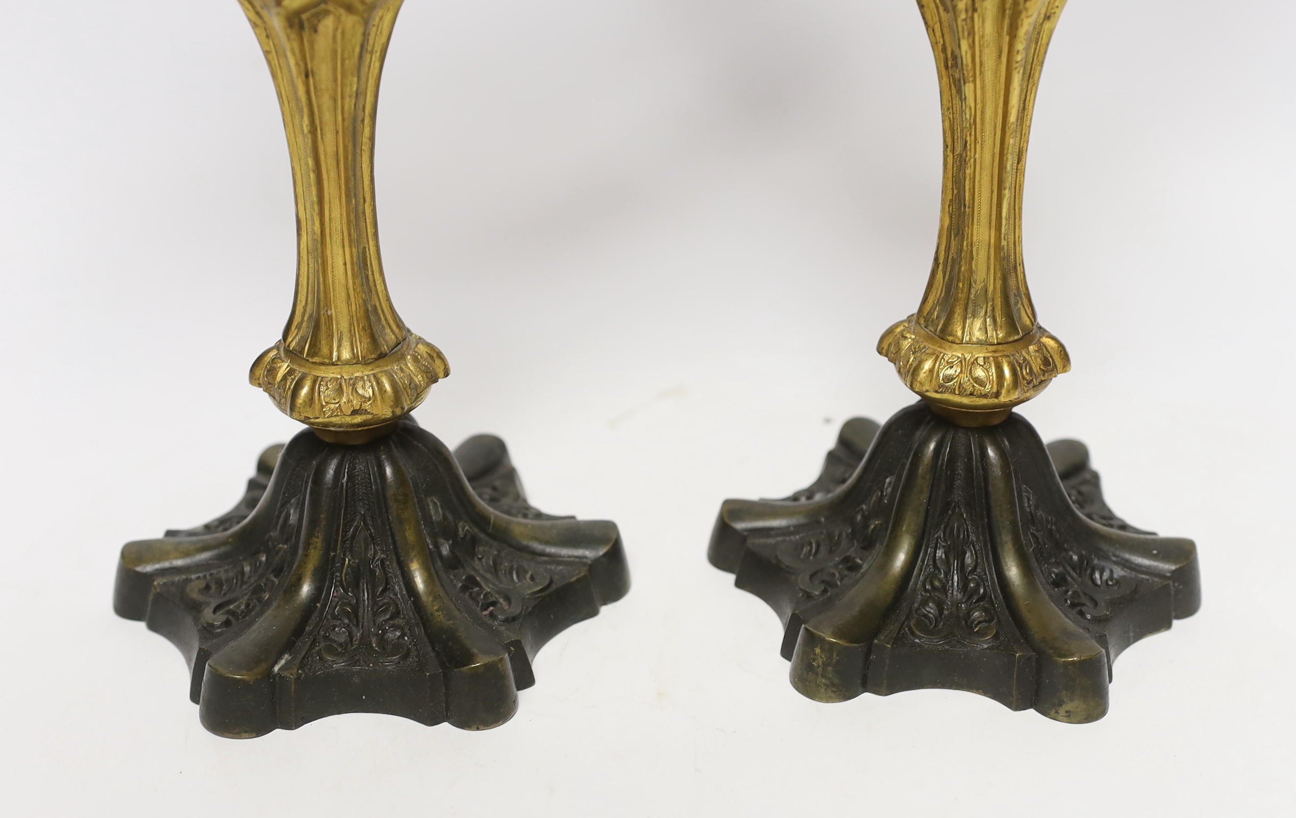 A pair of Victorian bronze and ormolu two branch candelabra, 39cm